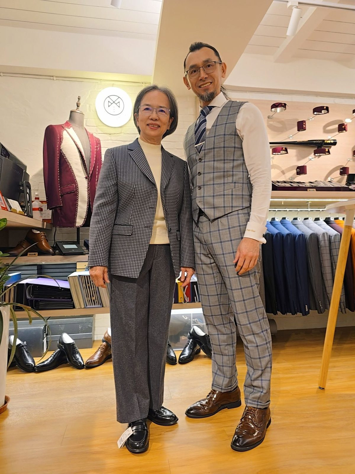優部瑪尾西服的師傅穿著自家訂製西裝